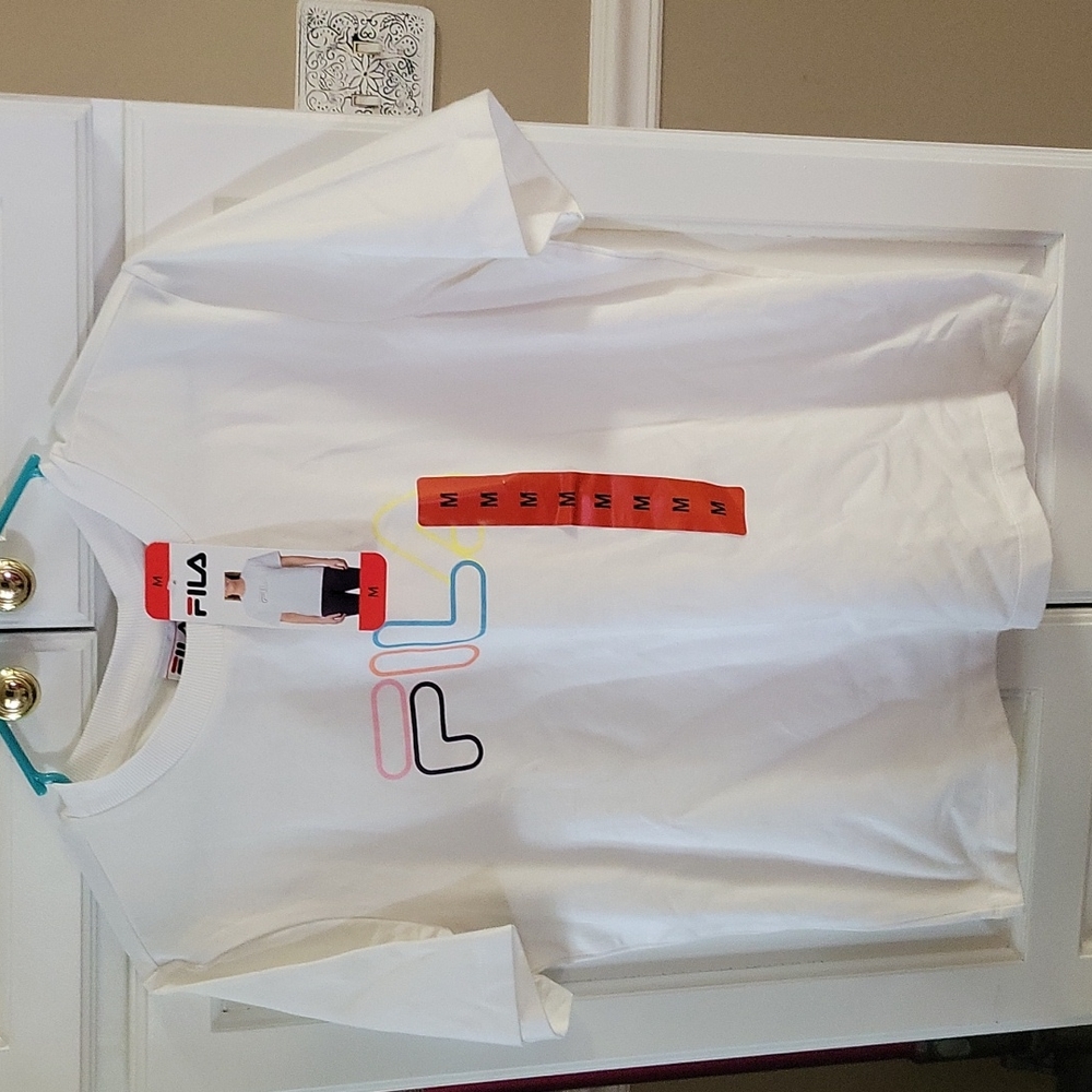 FILA white short sleeve stretch tee colorful logo on front Medium New with Tags…